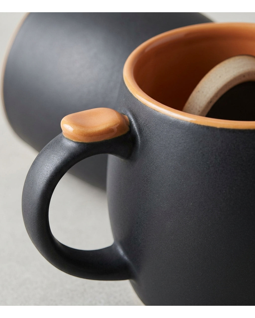 Wfkng Wide Belly Thumb-Rest Ceramic Coffee Mug 16 oz Charcoal Apricot - Detail view