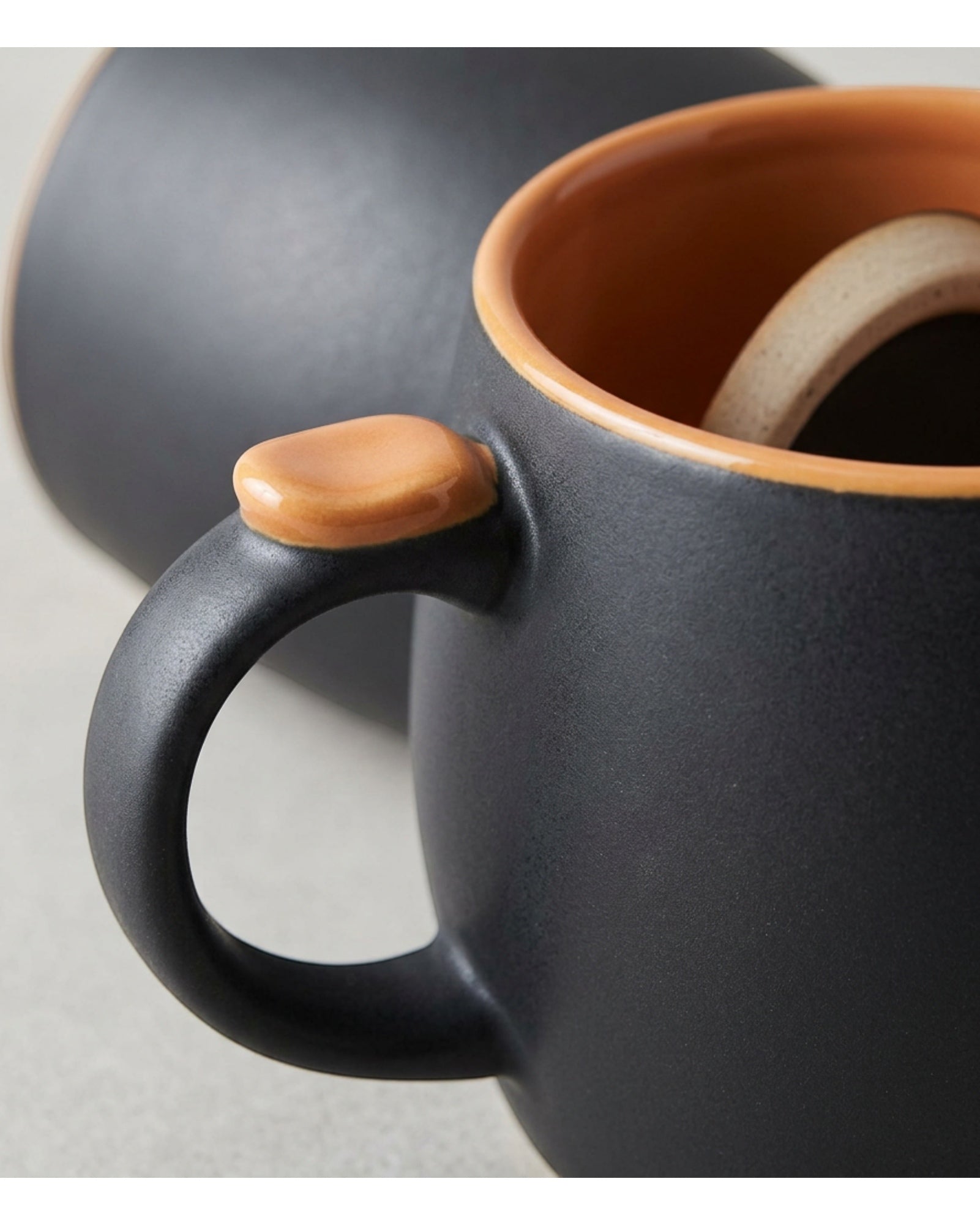Wfkng Wide Belly Thumb-Rest Ceramic Coffee Mug 16 oz Charcoal Apricot - Detail view